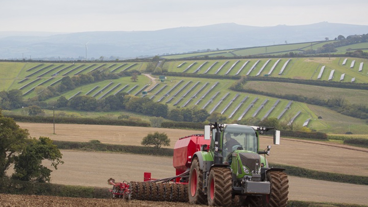 Tractor going across field