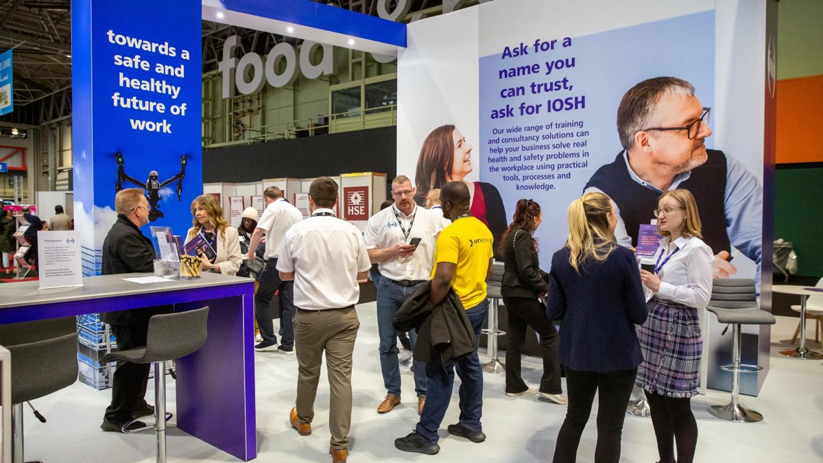 People is discussion at IOSH stand during the Health and Safety Event