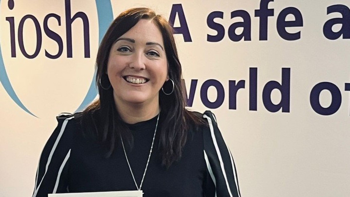 Laura Aucott receiving her President’s Distinguished Service Award