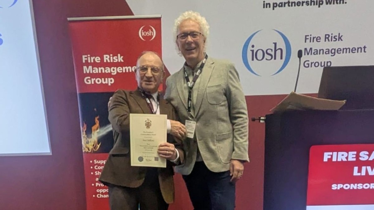 Peter Williams receives his Presidential award from Richard Bate