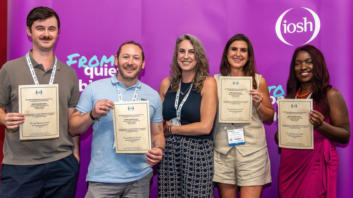 Four IOSH qualification graduates with President Kelly Nicoll