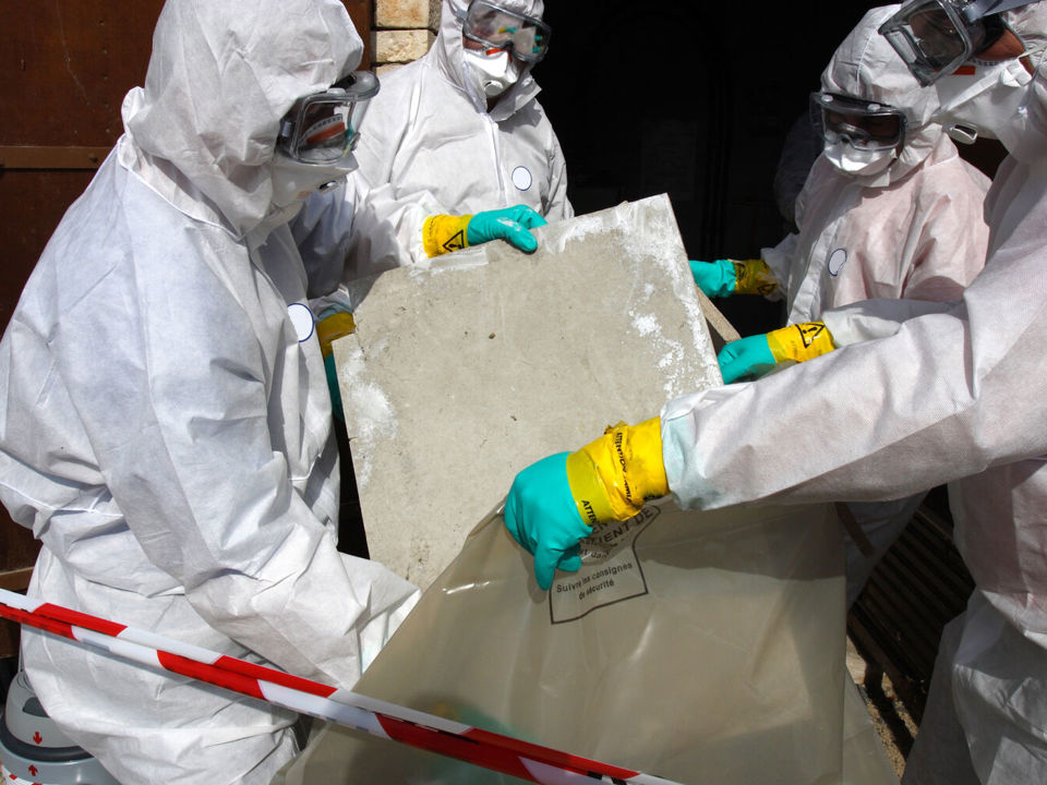 People removing asbestos