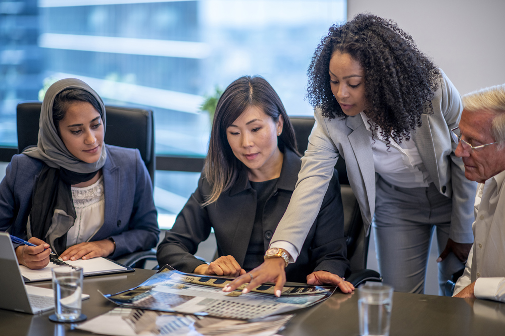 People together around a desk