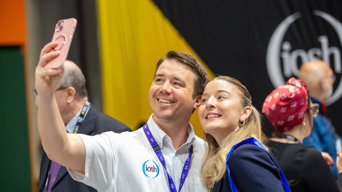 Two people taking a selfie together at the Health and Safety Event