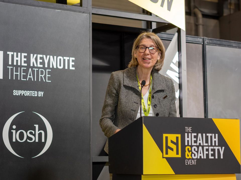 Sarah Newton speaking at a podium