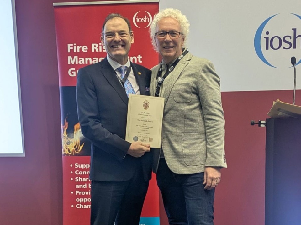 Tom Beswick-Brown (left) receives his award from President-Elect Richard Bate